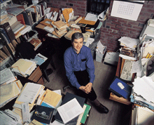 PHOTO:  In his Hinds office, paleobiologist Foote excavates piles and files of quantitative data in search of an evolutionary timeline able to stand up against genetic and fossil evidence.