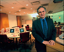 PHOTO:  Robert Zimmer in the Crerar computer lab.