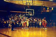 PHOTO:  It was standing room only for the Maroons' 62-52 semifinal victory against Lewis & Clark in the D-III midwest sectional.