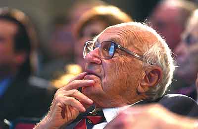 IMAGE: More than a face in the economics crowd: Milton Friedman, AM'33, at 90.