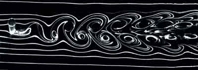 IMAGE:  Swirls are universal elements of turbulence, appearing in exploding stars and, more simply, in fluid flowing past an obstacle. The result shown above is the characteristic von Kármán street pattern.