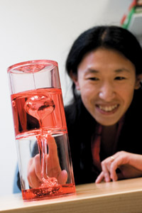 photo:Zhang observes liquid air bubbles.