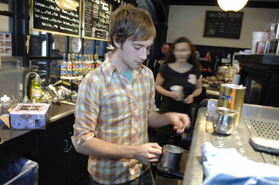 photo: barista making coffee