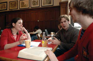 photo: Landback siblings Josie, Patrick, and Matt hang out in the Classics Café.