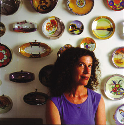 PHOTO:  As if Barbara Siegel doesn't have enough on her plate as a teacher and an artist - she also has a habit to keep up.  Above right:  A yellow-stoned hot pad from the kitchen of Elizabeth Huttner.