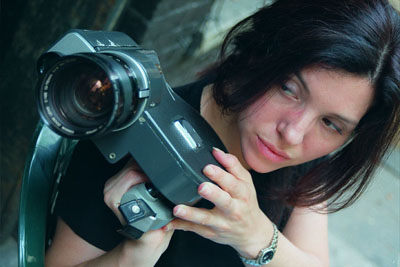 IMAGE:  Documentary filmmaker Julia D’Amico, AB’91, AM’95, and a scene from The Highwaymen.